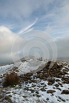 The path over Back Tor Cairn in the snow, Hope Valley, Peak District, Derbyshire