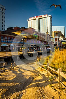 Path over sand dunes and the boardwalk in Atlantic City, New Jersey.