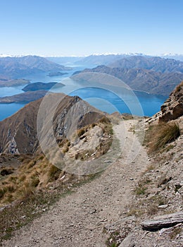 A path at the Roy's Peak with Wanaka Lake in the background in New Zealand