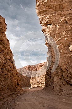 Path between salt formations at Valle de la Muerte photo