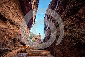 Path through steep cliffs, Entrance for lower and upper Shivalaya in Badami, Karnataka, INDIA