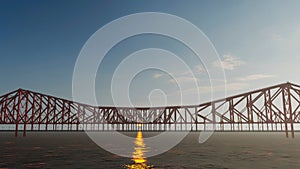 Path on the structural red bridge on a sunny day a little cloudy