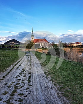 Path to the church in cloudy day