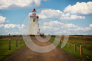 Path to the souris east lighthouse in prince edouard island photo