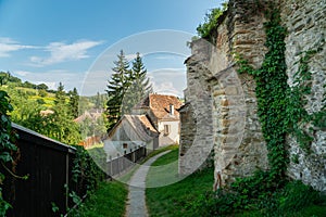 Path under the walls outside the Biertan fortified saxon church, Unesco World Heritage site, in Biertan village, Transylvania,