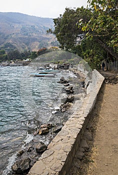 Pathway and docks along lake Atitlan at the coast of Santa Cruz la Laguna, Guatemala