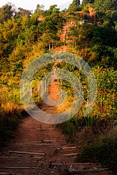 Pathway on hill during sunrise