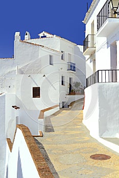 Pathway leading through the village Frigiliana photo