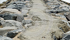 Pathway madeup of stone at beach