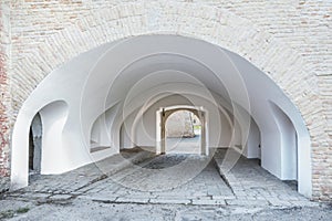 Pathway through the medieval gate .