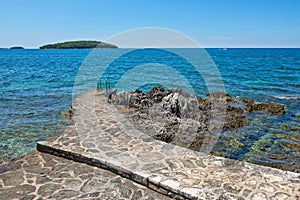Pathway on the rocky beach in Istria