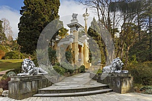 A pathway of stone lions to the pavilion at Sochi arboretum