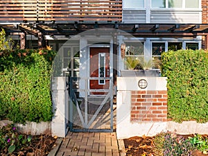 Pathway to residential entrance on sunny day in British Columbia