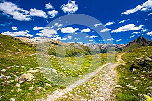 Pathway on the top of Berninapass in Swiss Alps