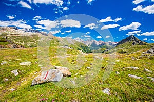 Pathway on the top of Berninapass in Swiss Alps