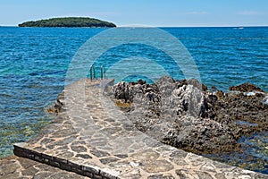 Pathway on the rocky beach in Istria