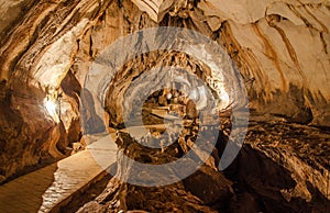 pathway underground cave in Laos, with stalagmites.