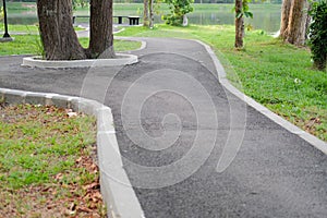 Pathway walkway path near pond in garden park