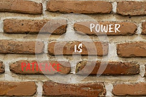 Patience is power symbol. Concept words Patience is power on beautiful brown brick. Beautiful brown brick wall background.