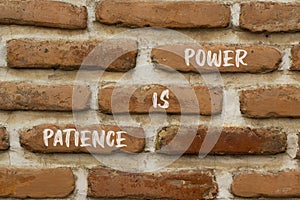 Patience is power symbol. Concept words Patience is power on beautiful brown brick. Beautiful brown brick wall background.