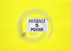 Patience is power symbol. Concept words Patience is power on beautiful white paper. Beautiful yellow paper background. Business