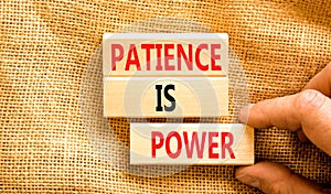 Patience is power symbol. Concept words Patience is power on beautiful wooden blocks. Beautiful canvas table canvas background.