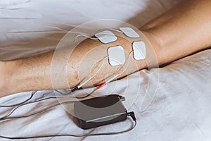 Patient applying electrical stimulation