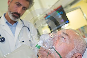 Patient on breathing mask
