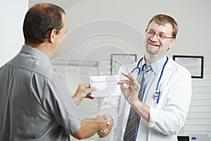 Patient bribing doctor photo