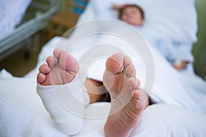 Patient with broken leg in a plaster cast