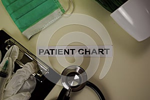 Patient Chart with inspiration and healthcare/medical concept on desk background