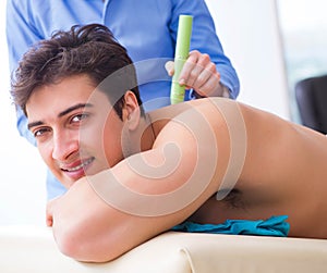 Patient in clinic undergoing laser scar removal