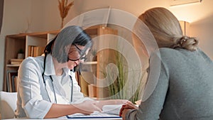 Patient consultation supportive doctor woman check