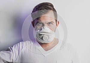 A patient with a coronavirus in quarantine, a person in a respiratory mask, photo