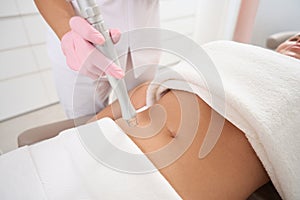 Patient on a cosmetic procedure at an esthetician