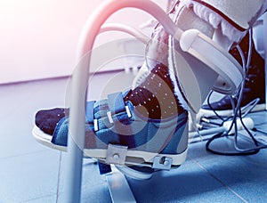 Patient on CPM machines, continuous passive range of motion.