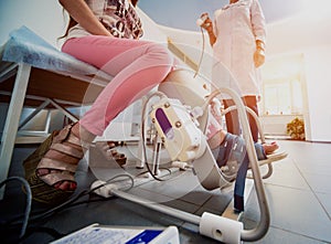 Patient on CPM machines, continuous passive range of motion.