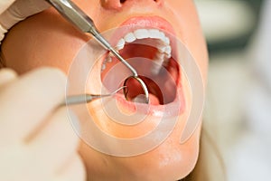 Patient with Dentist - dental treatment