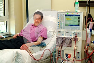 Patient on dialysis machine