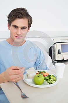 Patient eating healthy food in hospital