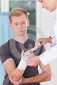 Patient having bandaged hand