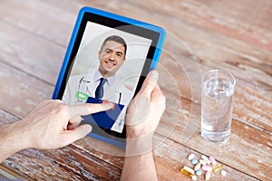 Patient having video chat with doctor on tablet pc