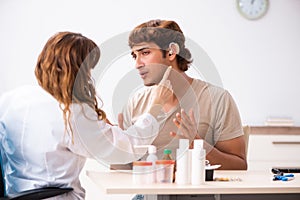 The patient with hearing problem visiting doctor otorhinolaryngologist