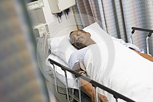 Patient In Hospital Bed