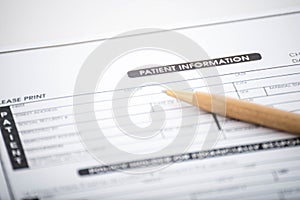 Patient information form and pen on desk,Medical questionnaire