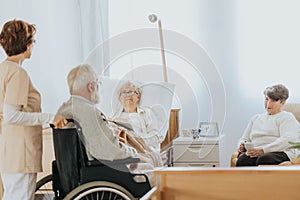 Patient lies in a hospital bed