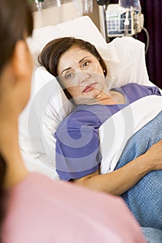 Patient Lying In Hospital Bed