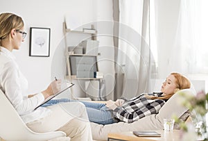 Patient lying in psychologist office