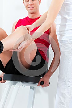 Patient at the physiotherapy doing physical therapy