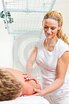 Patient at the physiotherapy - massage photo